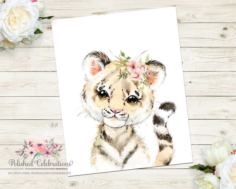 May include: A watercolor painting of a cute tiger cub with a pink flower crown. The tiger has brown and white stripes and big brown eyes. The background is white.