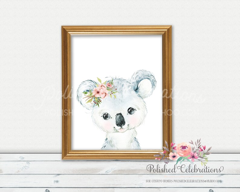 May include: A watercolor painting of a koala bear with a pink flower crown. The koala is looking at the viewer with a sweet expression. The background is white.