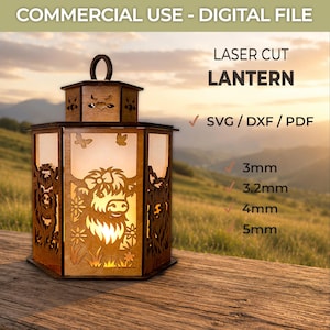 May include: A laser-cut wooden lantern featuring a Highland cow design with cutouts of flowers and butterflies. The text reads: COMMERCIAL USE - DIGITAL FILE, LASER CUT LANTERN, SVG / DXF / PDF, 3mm, 3.2mm, 4mm, 5mm. The lantern is illuminated.