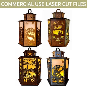 May include: Four wooden lanterns with laser-cut designs. One depicts a Highland cow, another a camping scene, a third a beach scene, and the last a dog. Each lantern has a handle and an internal light source. The text at the top says "COMMERCIAL USE LASER CUT FILES."