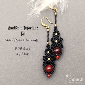 May include: Black and gold macrame earrings with red gemstone beads. The earrings are handmade and feature a knotting pattern. The image includes the text "Manifesto Tutorial & Kit", "Manifesto Earrings", "PDF Step by Step", and "Nostalghie Crystal Jewellery".