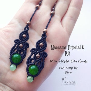 May include: Macrame tutorial and kit for making Manifesto Earrings. The kit includes black cord, copper beads, and green stone beads. The earrings are made with a knotting technique and feature a delicate, intricate design.