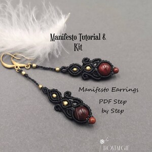 May include: Black and gold macrame earrings with red gemstone beads. The earrings are part of a kit that includes a PDF tutorial. The text "Manifesto Earrings PDF Step by Step" is visible in the image.
