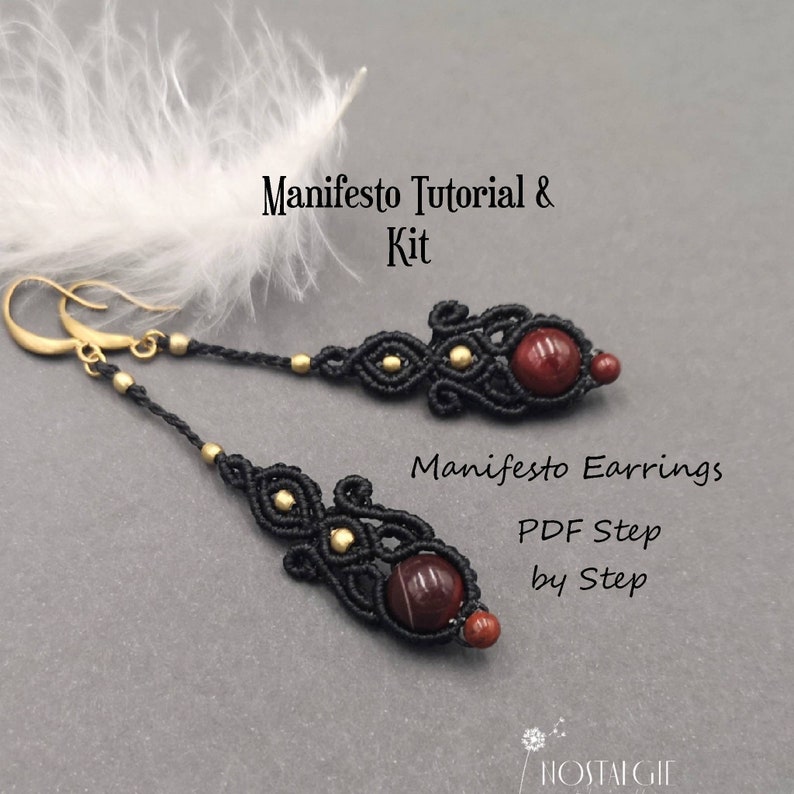 May include: Black and gold macrame earrings with red gemstone beads. The earrings are part of a kit that includes a PDF tutorial. The text "Manifesto Earrings PDF Step by Step" is visible in the image.