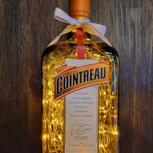 Cointreau liqueur Illuminated Liquor bottle.  LED Battery operated lights. Orange color lights