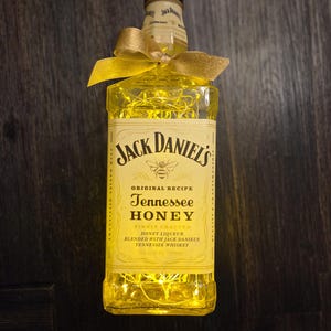 Jack Daniels Tennesee Honey Liquor bottle.  LED Battery operated lights. Gold Lights