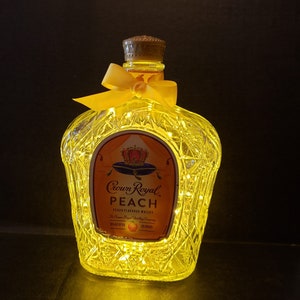 Crown Royal Peach Illuminated Liquor bottle.  LED Battery operated lights. Gold Lights