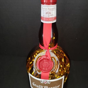 Grand Marnier Liquor bottle.  LED Battery operated lights.