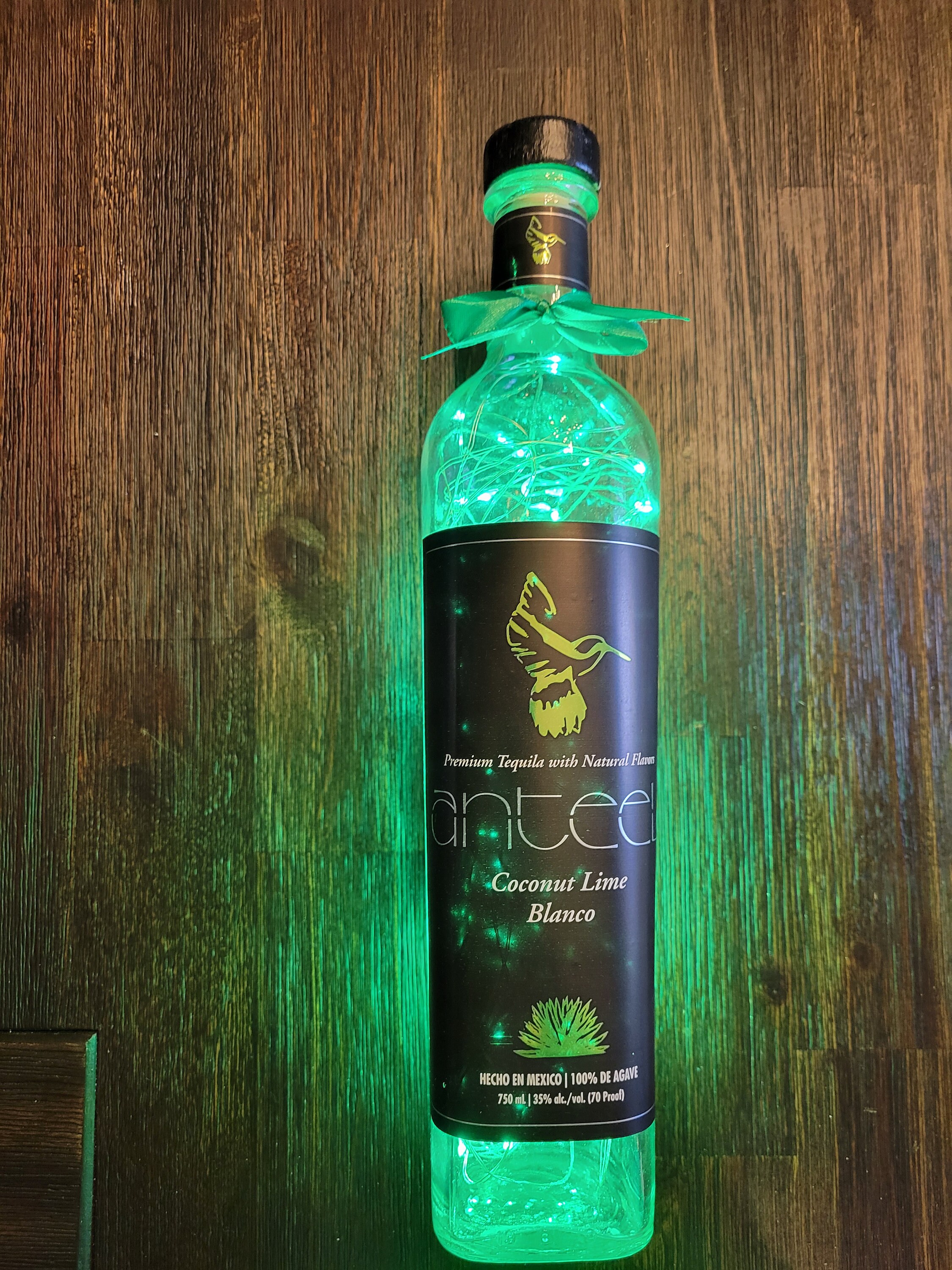 Anteel Coconut Lime Blanco Tequila  bottle.  1.75L LED Battery operated lights. Green Lights
