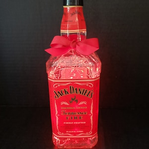 Jack Daniels Tennesee Liquor bottle.  LED Battery operated lights. Red Lights