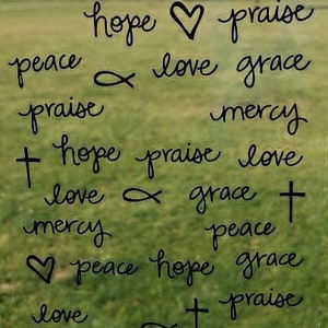 May include: A green background with black text that reads "hope", "praise", "peace", "love", "grace", "mercy", "+", and "fish" symbols.