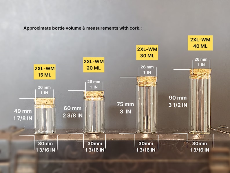 May include: Four clear glass bottles with cork stoppers and measurements in inches and millimeters. The bottles are labeled with the text "2XL-WM" and the volume in milliliters: 15 ML, 20 ML, 30 ML, and 40 ML.