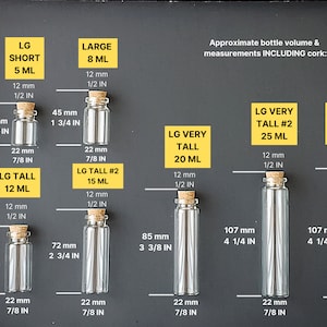 May include: A set of ten clear glass bottles with cork stoppers in various sizes, labeled with their approximate volume in milliliters and inches. The bottles are arranged in a row on a black background.  Approximate bottle volume & measurements INCLUDING cork: