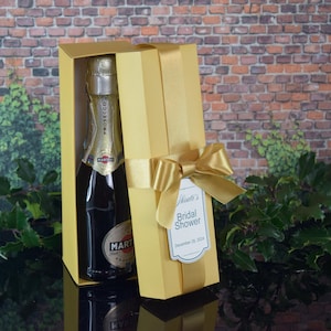 Gold wine box, personalized wine box, wine gift packaging, wine box with ribbon, luxury wine packaging, custom wine label, wine box