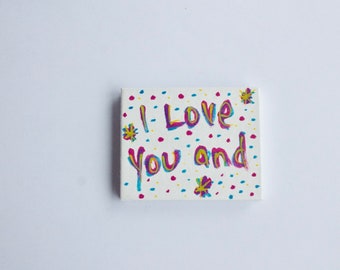 Love Is.. A handmade concertina book to cradle in your palm: "I Love You and"