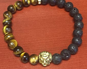 Brown Tigereye and black lava beaded bracelet with gold lion head charm