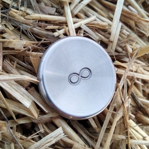 Titanium contact coin &quot;Infinite Wave&quot;, skill toy, Fidget stone, worry coin, pocket toy, one side engrave
