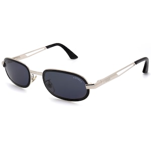 Sting vintage sunglasses, made in Italy. Small oval sunglasses with spring hinges