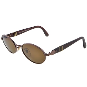 Oval vintage sunglasses by Lozza, made in Italy. Classic copper sunglasses for men and women