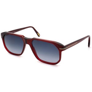 May include: Red-framed sunglasses with gradient blue lenses. The sunglasses have a rectangular shape with a slightly rounded bottom. The temples are thin and extend to the ear pieces. The lenses transition from a darker blue at the top to a lighter blue at the bottom.