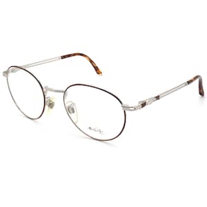 Sting round vintage eyeglasses frame with spring hinges, Italy 90s