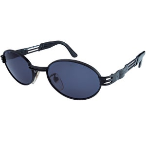 Lozza black oval vintage sunglasses, made in Italy. Classic black or silver metal sunglasses for men and women