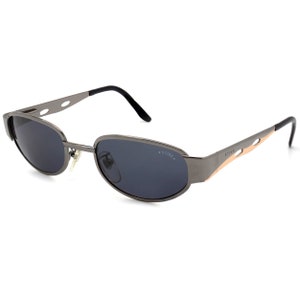 Sting vintage sunglasses 90s, made in Italy. Art Deco sunglasses with spring hinges