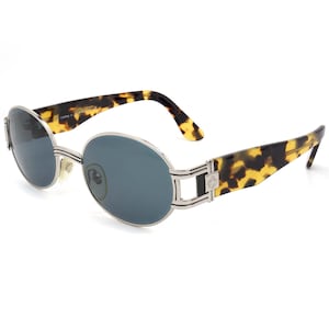 Von Furstenberg vintage sunglasses, made in Italy. Gold oval sunglasses for men and women, authentic 80s vintage