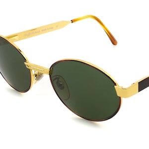 Old Florence vintage sunglasses, made in Italy. Gold oval sunglasses for men and women
