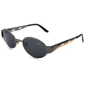 Sting vintage sunglasses, made in Italy. Oval art deco sunglasses with spring hinges, NEW