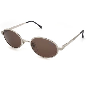 Sting vintage sunglasses 90s, made in Italy. Oval sunglasses for men and women