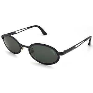 Sting vintage sunglasses, made in Italy. Small oval sunglasses with spring hinges