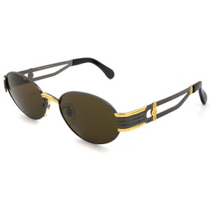 Victorian sunglasses by Egon Von Furstenberg, made in Italy. Oval vintage sunglasses 80s, tagged