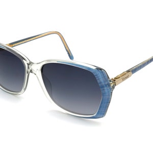 Authentic Versace vintage sunglasses, made in Italy in the 1970s. Blue/Pink crystal frame with UV protected lenses, new old stock, tagged