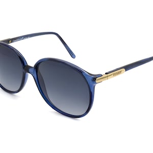 Authentic Versace sunglasses, made in Italy in the 1980s. Vintage sunglasses for women, tagged