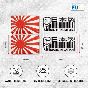 Könnte beinhalten: Zwei rechteckige Aufkleber mit einem rot-weißen Sonnenstrahlen-Design und zwei Aufkleber mit einer schwarz-weißen Grafik einer Figur, einem Strichcode und dem Text 'MADE IN JAPAN'. Die Aufkleber messen 30mm mal 20mm und 37mm mal 19mm.