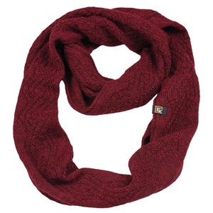 May include: A burgundy infinity scarf made of a knitted material. The scarf is looped and has a small rectangular tag with a logo on it. The scarf is a solid color and appears to be warm and cozy.