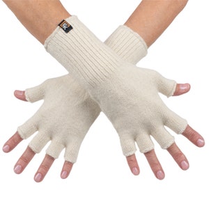 May include: A pair of cream-colored fingerless gloves with a ribbed cuff. The gloves have a small black tag with the letters "EK" on them.