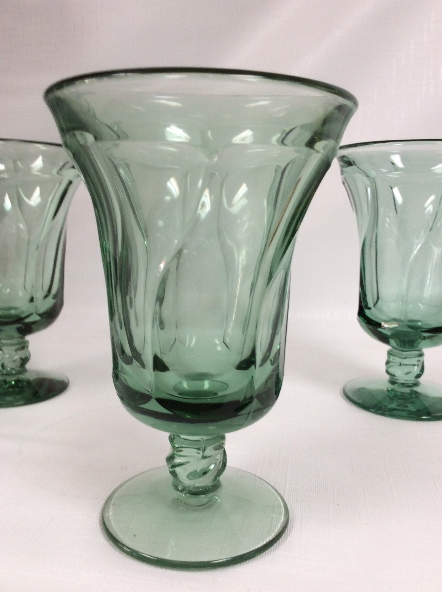 Set of four Fostoria Jamestown green iced tea glasses,