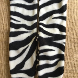 Fun zebra print fleece socks. Women’s sizes 6 through 10.