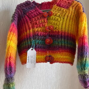 Handknitted girl’s cropped cardigan