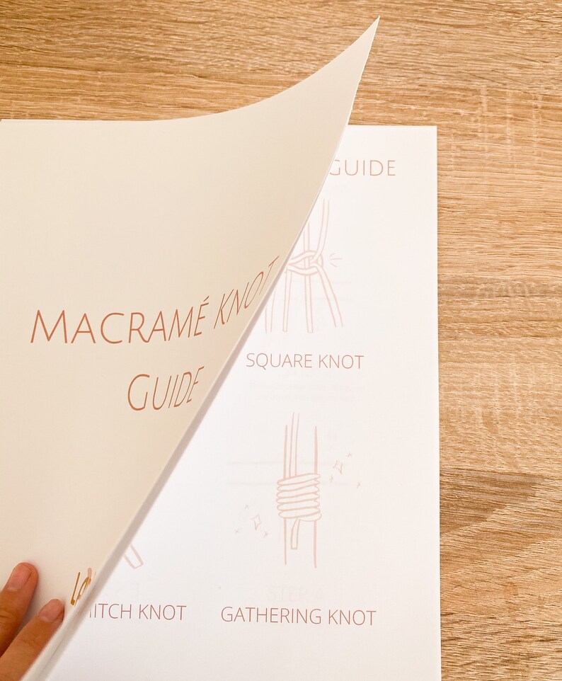 May include: A guide to macrame knots, featuring illustrations of the square knot, gathering knot, and hitch knot. The guide is printed on white paper with a light brown background.