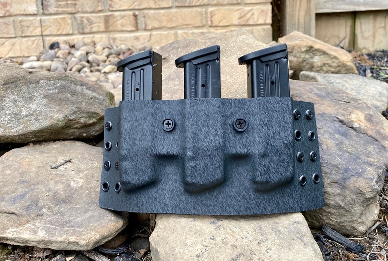 Glock 48 triple mag carrier OWB. Made from .080 kydex with Etsy
