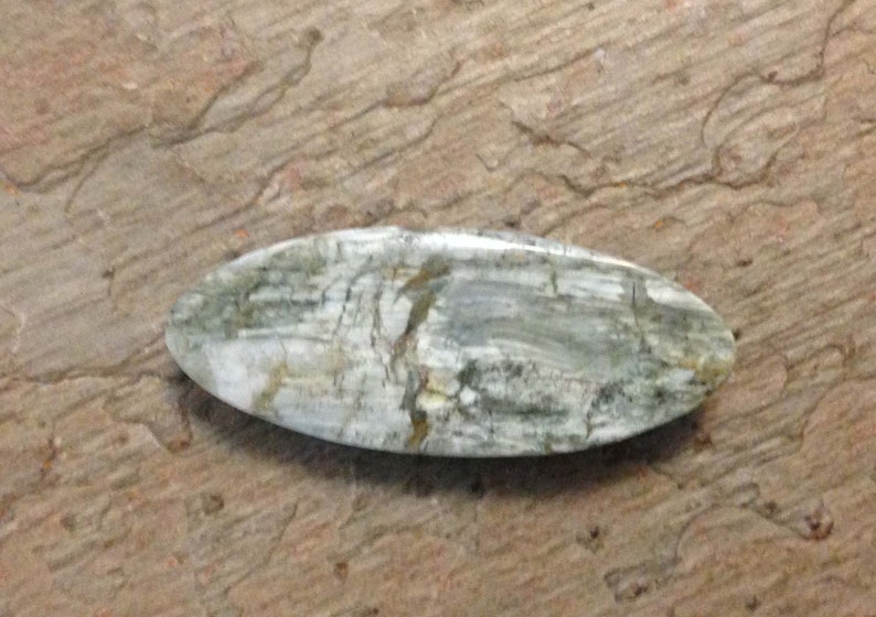 White Canadian Tiger Eye Cabochon.