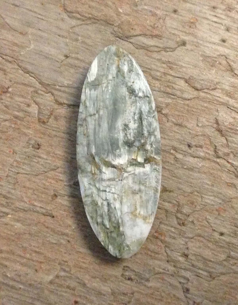 White Canadian Tiger Eye Cabochon.