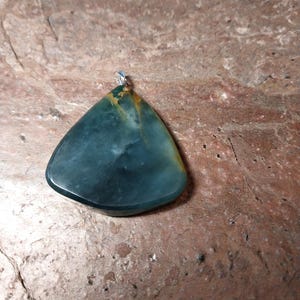 Hand Carved Guatemalan Jadeite Pendant.