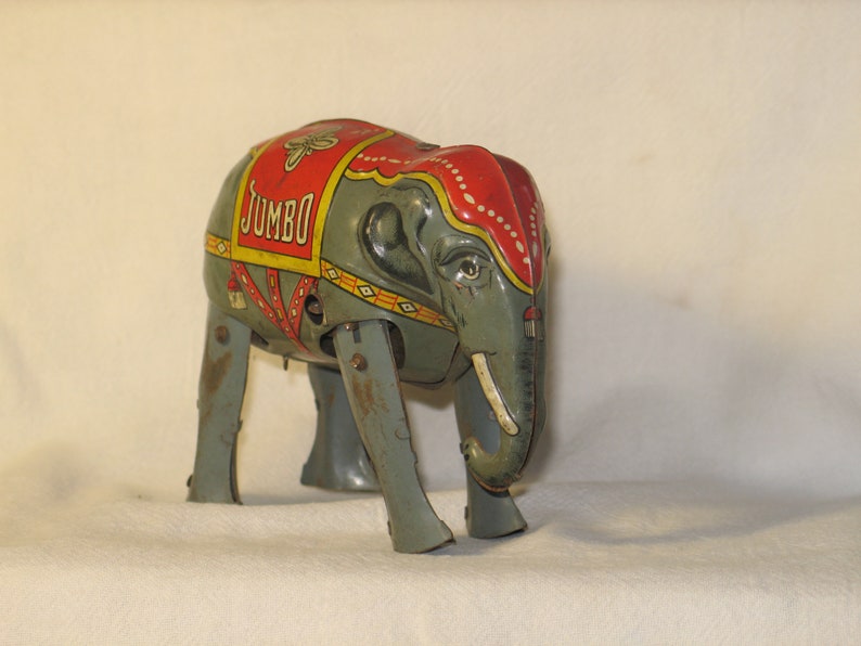 Lithographed Mechanical Tin Walking Elephant wind up toy. Etsy