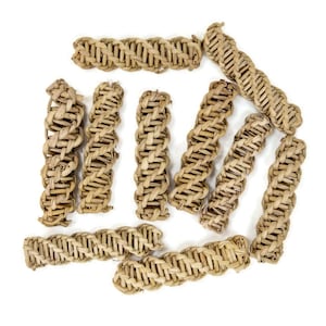 May include: A set of ten woven straw chew toys for small animals. The toys are in various shapes and sizes, and are made of natural materials.