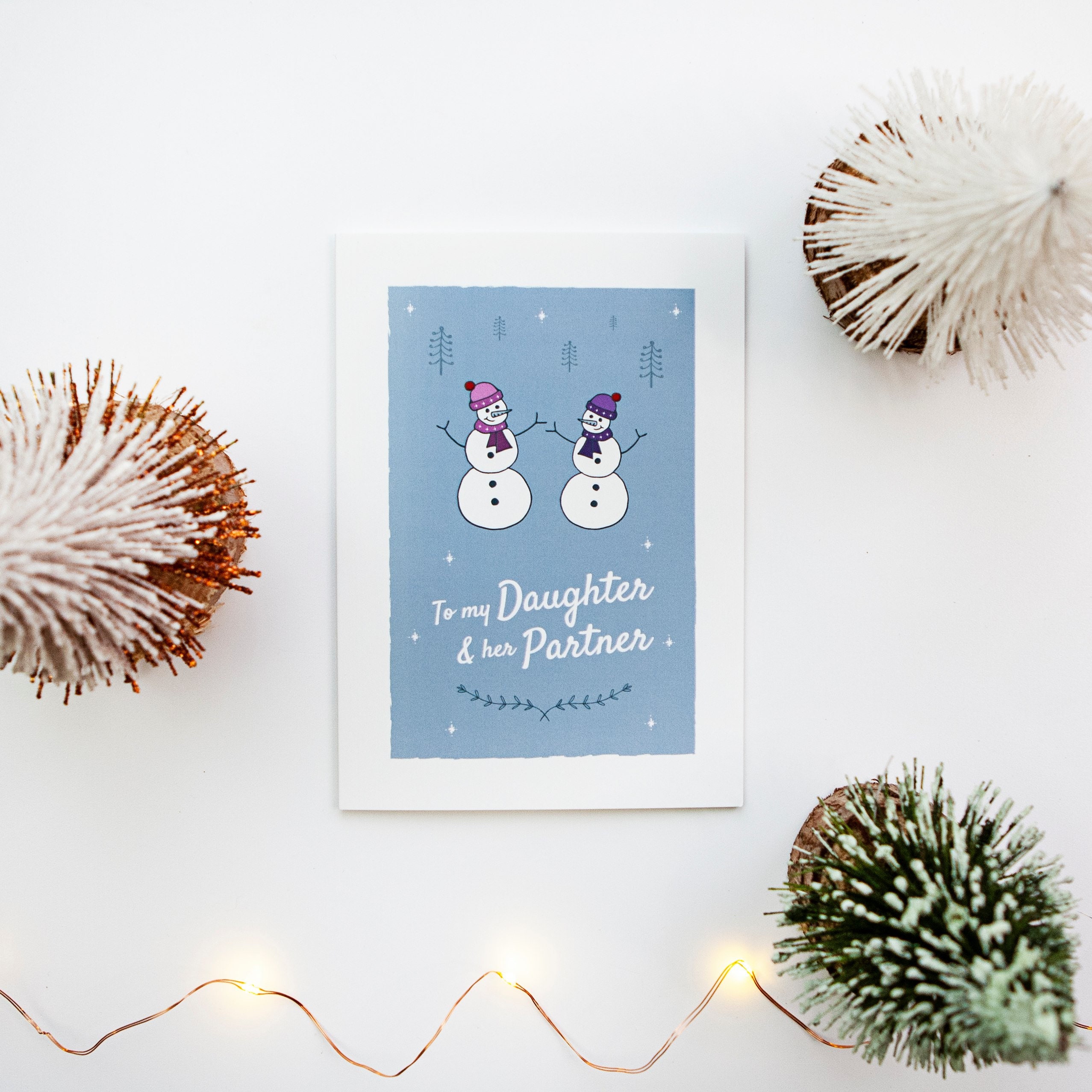 Biglietto di Natale per figlia e genero. Design con pupazzo di