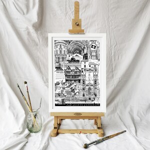May include: A black and white collage print of various buildings and landmarks in North Yorkshire, England. The print is framed and displayed on an easel.